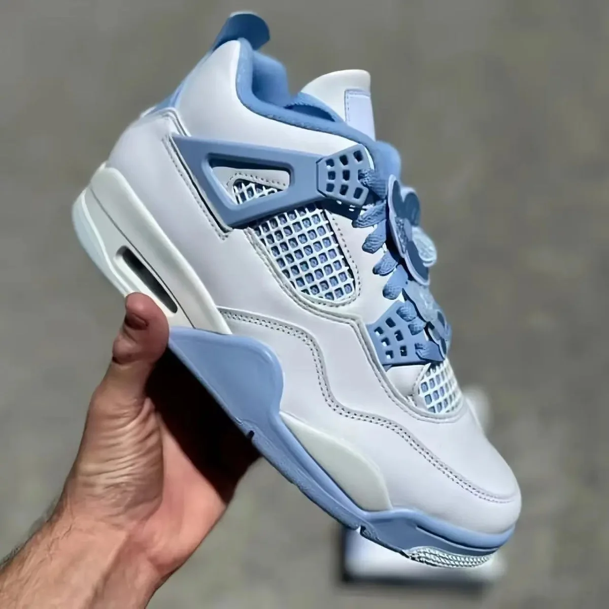 Nike Air Jordan 4 University Blue Sneakers