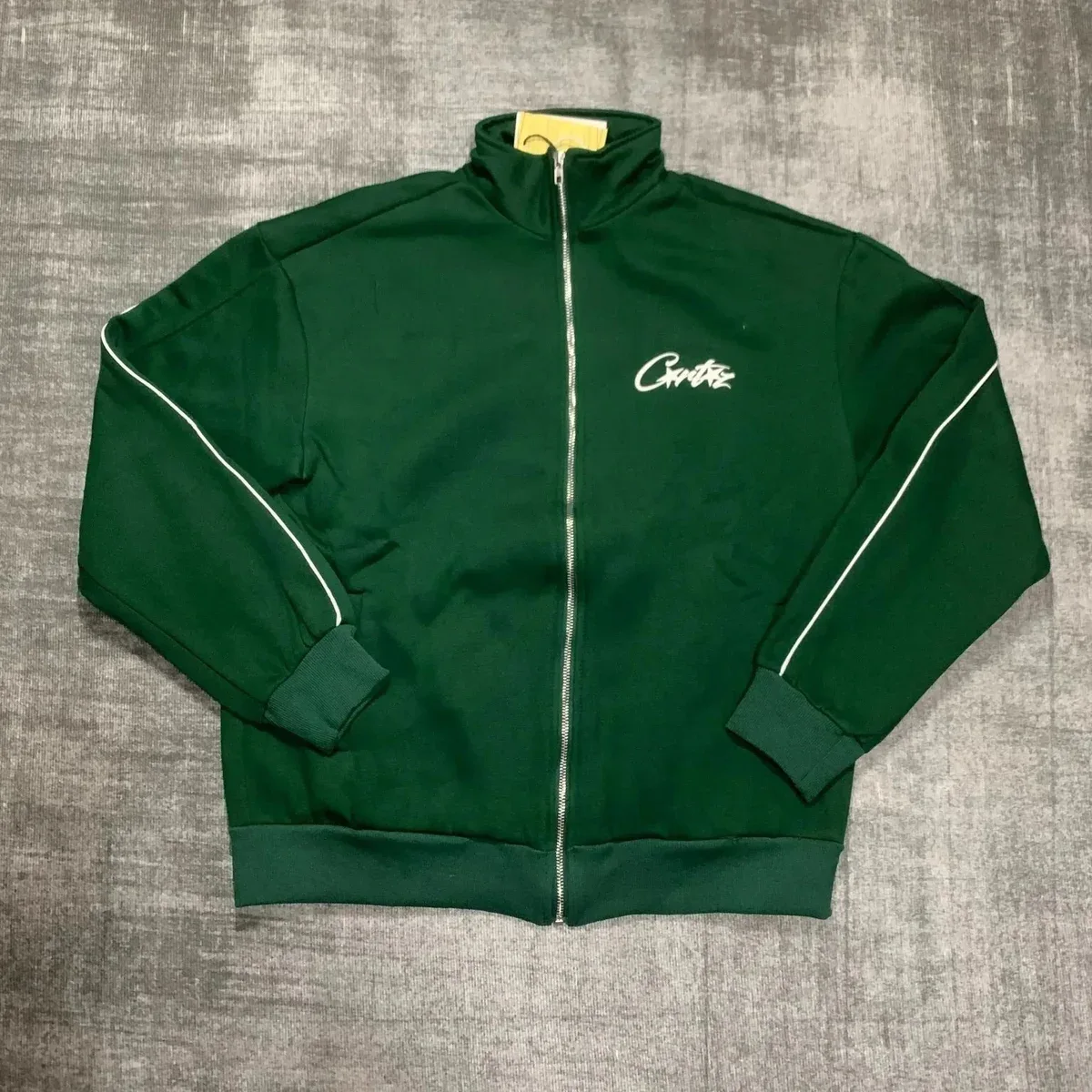 Green Track Jacket with White Piping and Script Logo