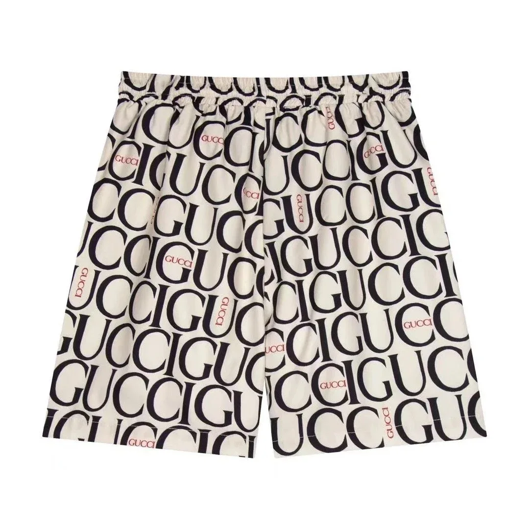 Gucci Gucci All-over Logo Print Shorts White White - 1