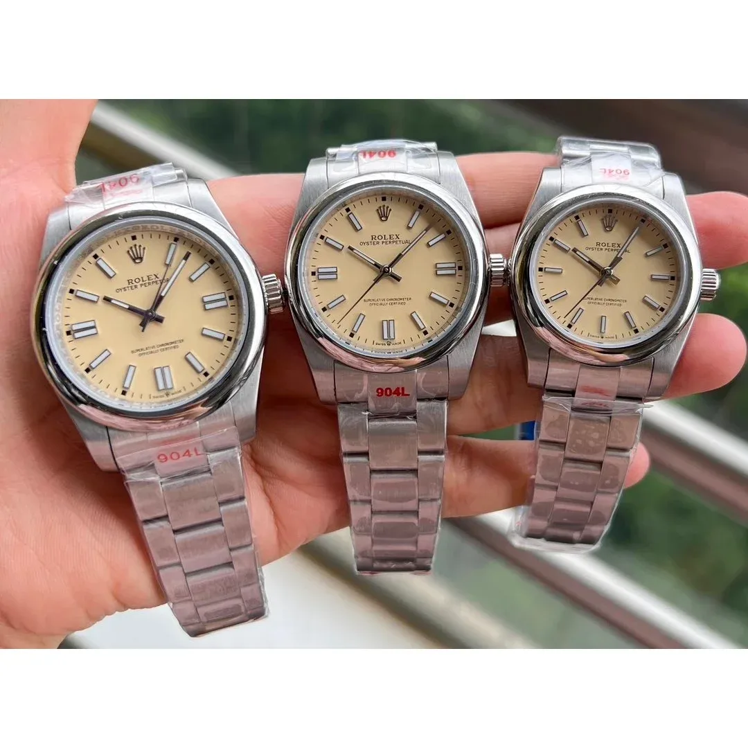 Rolex Rolex Oyster Perpetual Silver Case Yellow Dial Steel Watch Silver