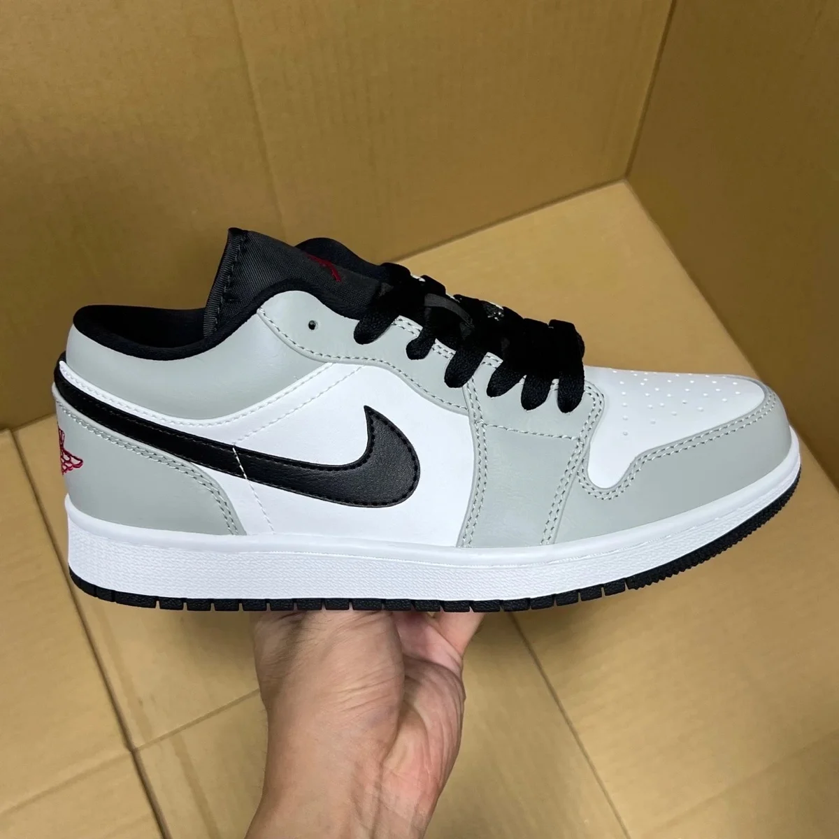 Jordan Jordan Air Jordan 1 Low Sail/Grey/Black Sneakers Grey