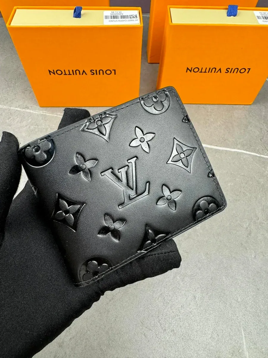 Louis Vuitton Tabi Portafoglio bifold con monogramma nero