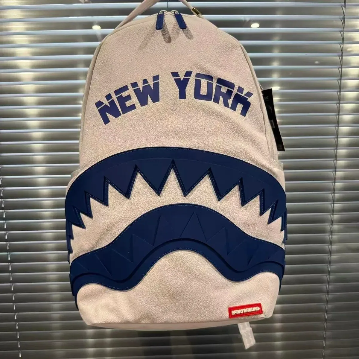 Sprayground Sprayground New York Shark Backpack Beige/Navy Bags & Backpacks Beige - 1