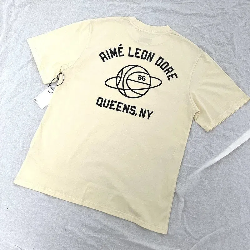 Aimé Leon Dore Aimé Leon Dore Apricot Graphic T-Shirt Beige - 1