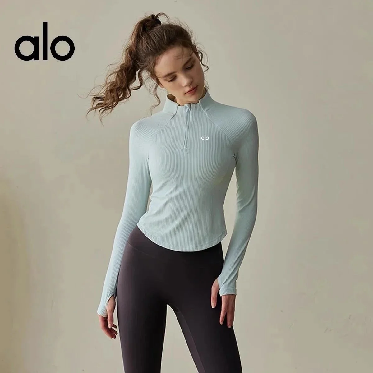 Alo Yoga Alo Ribbed Zip Neck Long Sleeve Top in碧泉绿 Green - 1