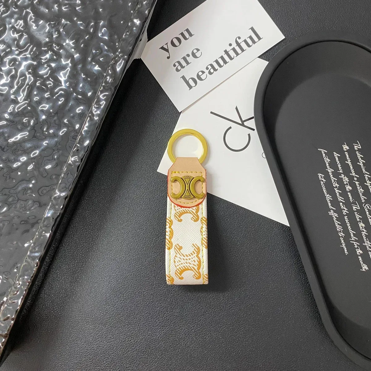 Celine Celine Classic Logo Keychain Beige/Gold Accessory Beige - 1