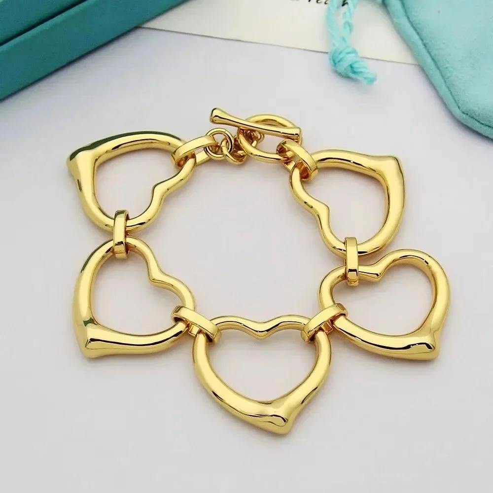 Tiffany & Co. Tiffany & Co. Return to Tiffany Heart Link Bracelet Gold Gold