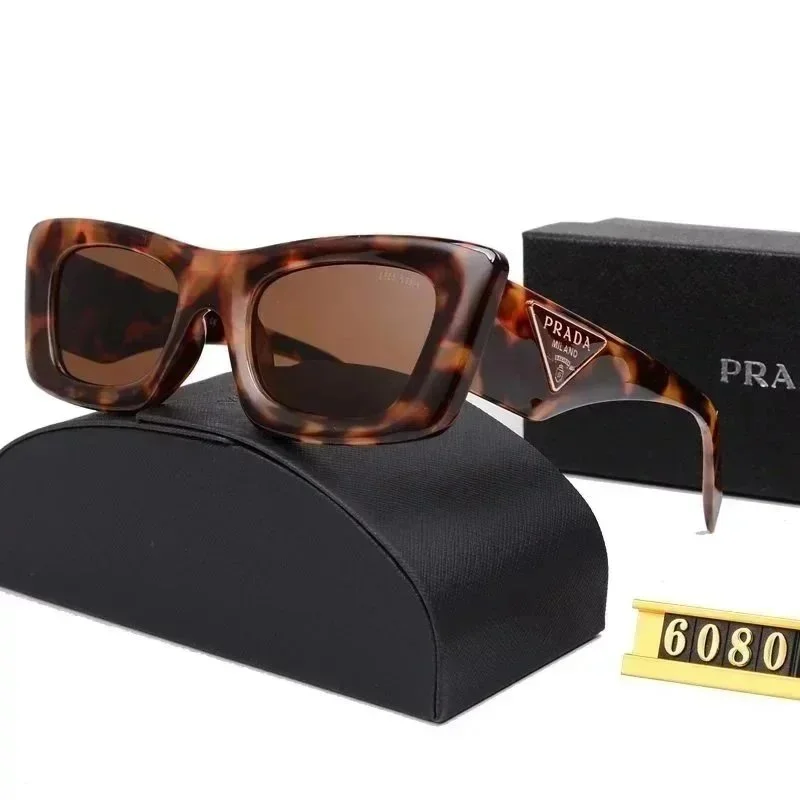 Prada Prada Tortoiseshell Cat-Eye Sunglasses Brown - 1