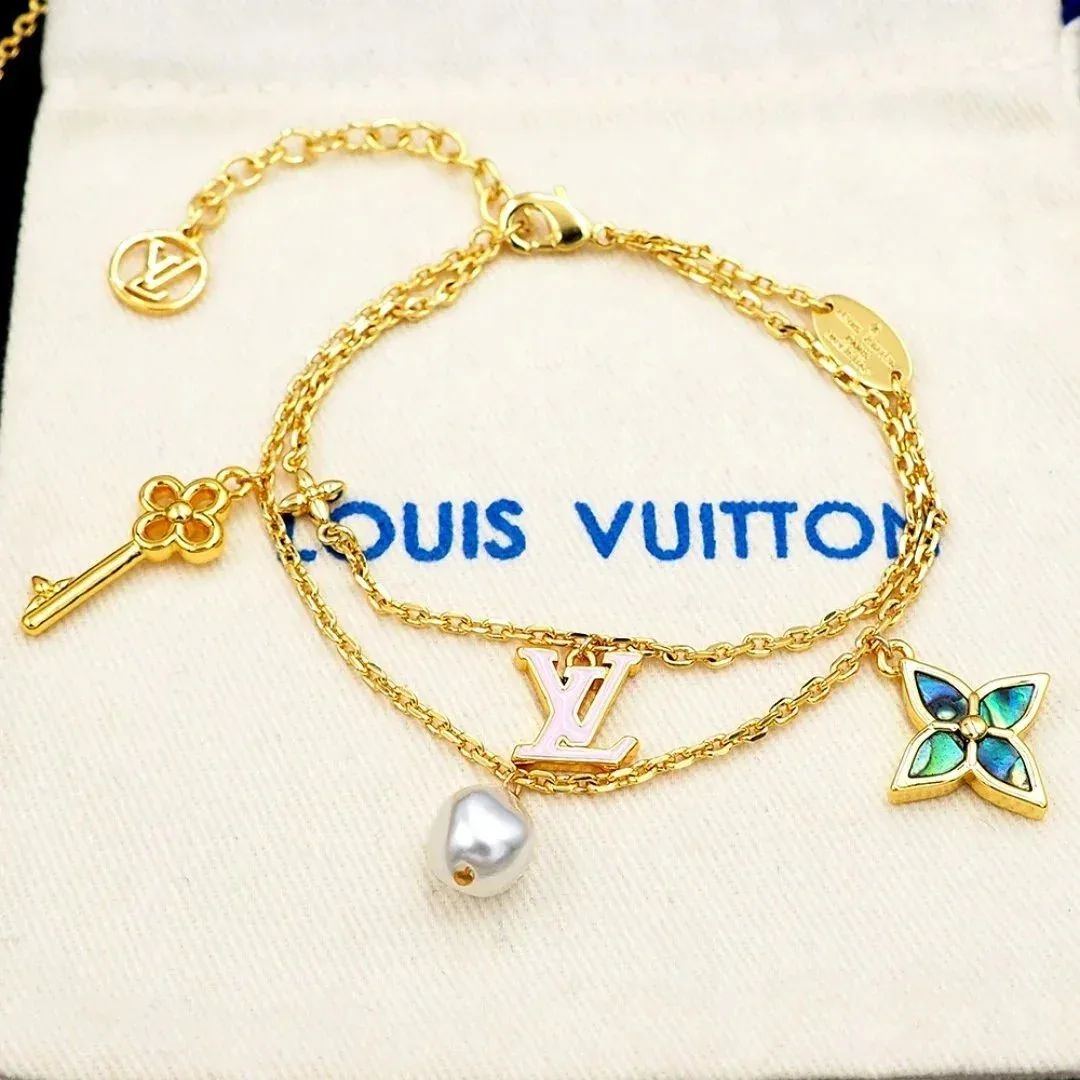 Louis Vuitton Louis Vuitton Key & Pearl Charm Bracelet Gold - 1