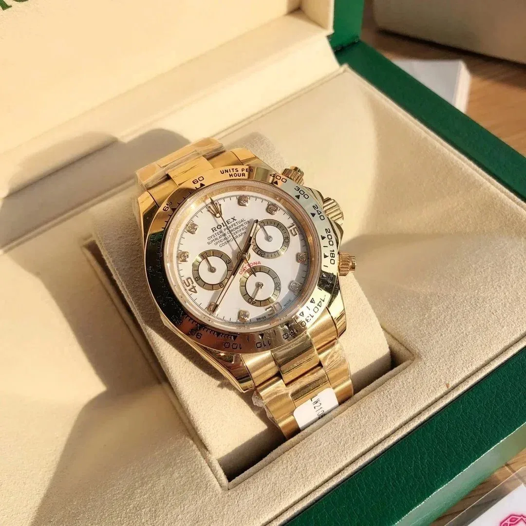 Rolex Rolex Daytona Yellow Gold/White Dial Chronograph Watch Gold