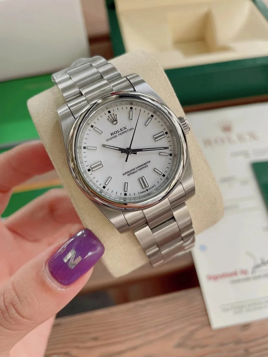 Rolex Rolex Oyster Perpetual Silver Case Ivory White Dial Watch Silver