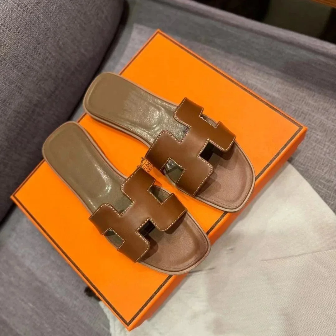 Hermès H Klassische Ledersandalen Braun
