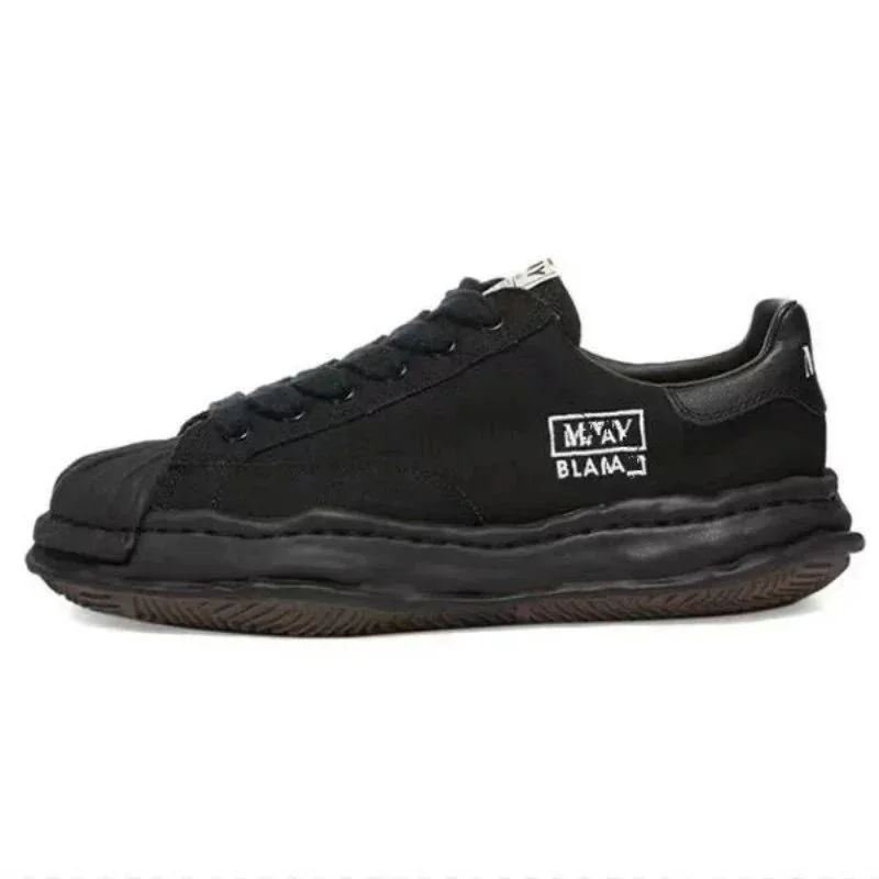 Maison Mihara Yasuhiro Maison Mihara Yasuhiro Miyake BLAMAJ Triple Black Sneakers Black