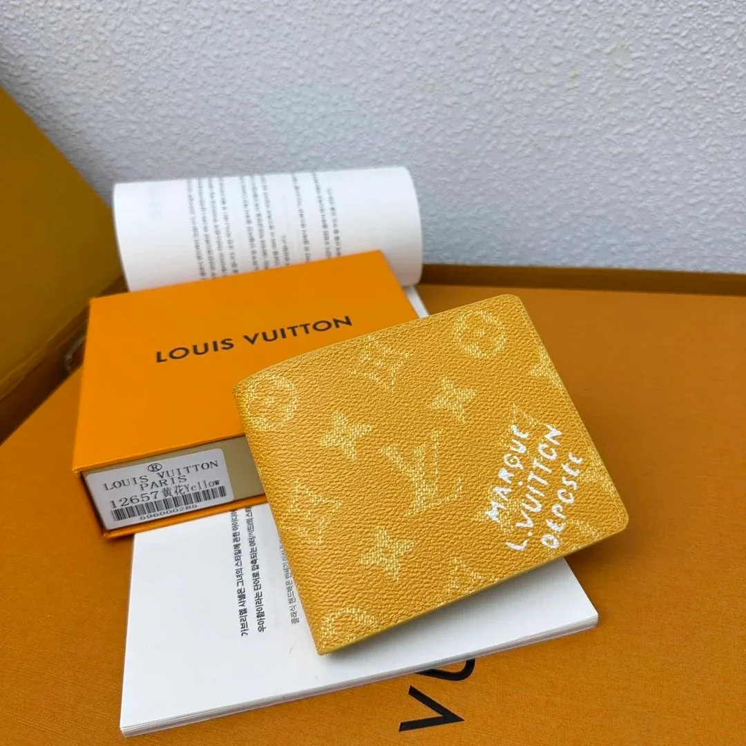 Louis Vuitton Tabi محفظة مونوغرام صفراء