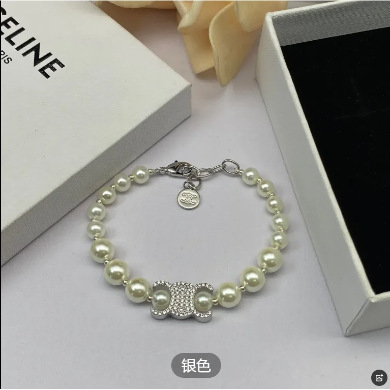 Celine Celine Silver Pearl Bow Bracelet Silver