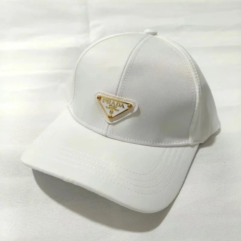 Prada White Gold Logo Cap Headwear — Headwear find on USFans spreadsheet