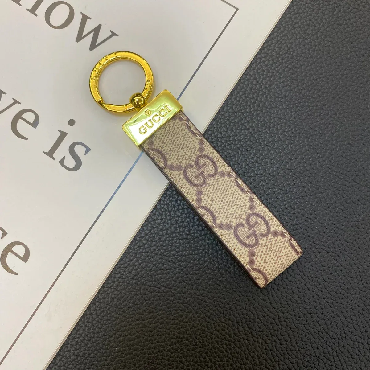 Gucci Gucci GG Supreme Keychain Beige/Gold Accessory Beige - 1