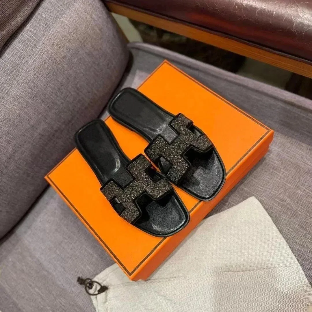 Hermès Schwarze glitzernde H-Sandalen