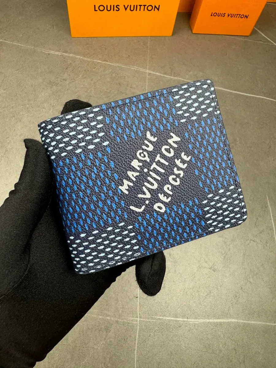 Louis Vuitton Tabi portemonnee blauw Leer met patroon