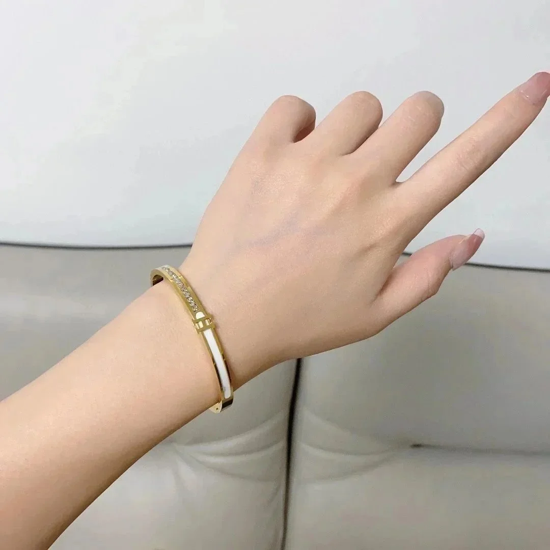 Tiffany & Co. Tiffany & Co. Tiffany T Gold and White Enamel Bracelet Gold