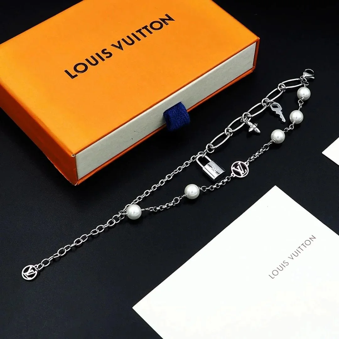 Louis Vuitton Louis Vuitton Pearl & Lock Charm Bracelet Silver - 1