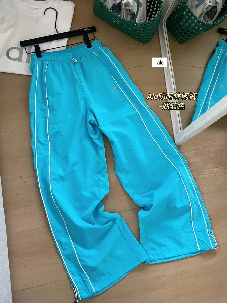 Alo Yoga Alo Lake Blue Track Pants Blue - 1