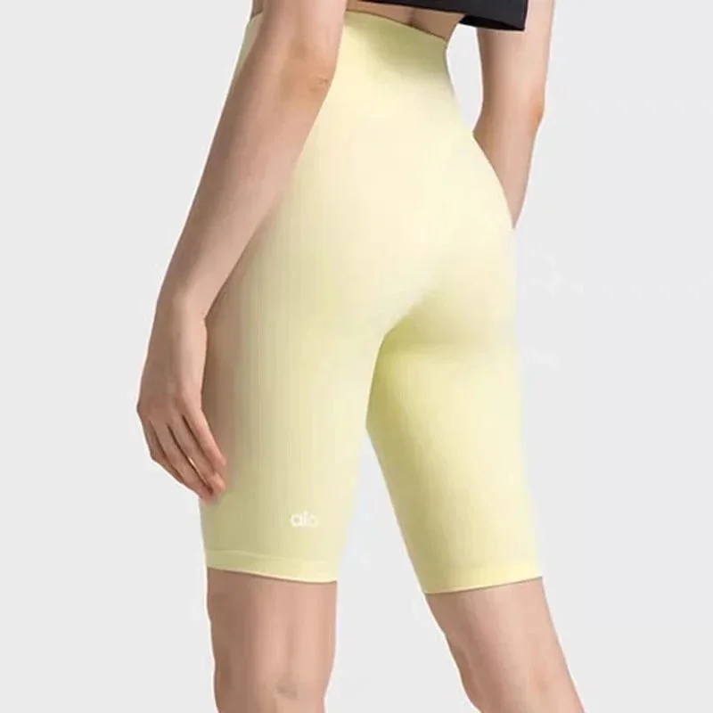 Alo Yoga Alo Yoga Wunder Under Citrus Yellow Biker Shorts Yellow - 1