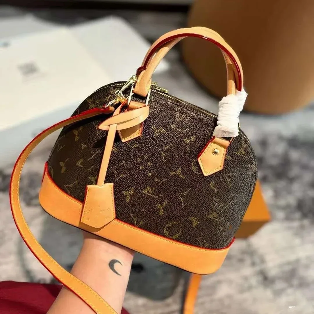 Louis Vuitton Louis Vuitton Speedy Monogram Shell Handbag Brown