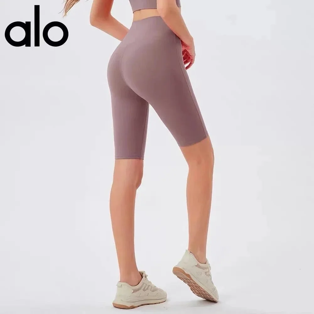 Alo Yoga Alo Biker Shorts in Mauve Purple - 1